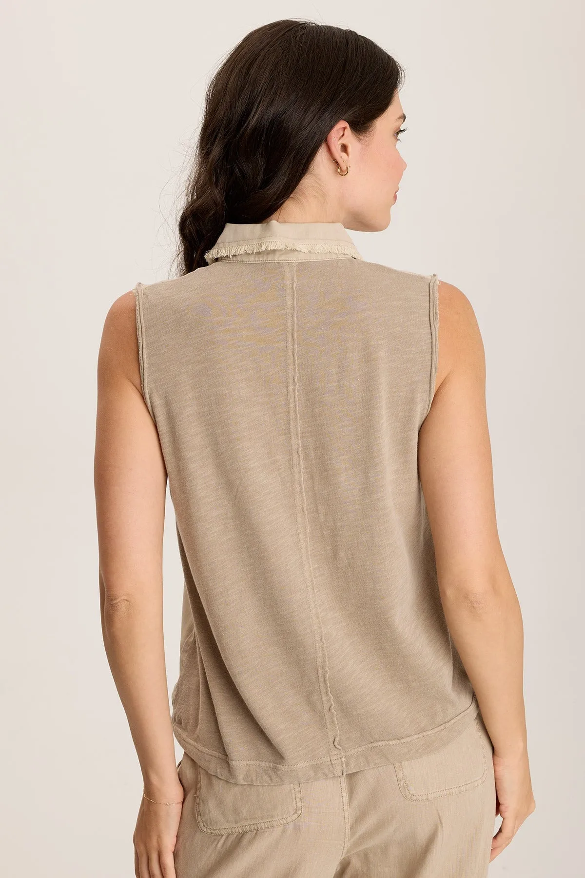 Rein Sleeveless Polo with Snap Front & Cinched Hem