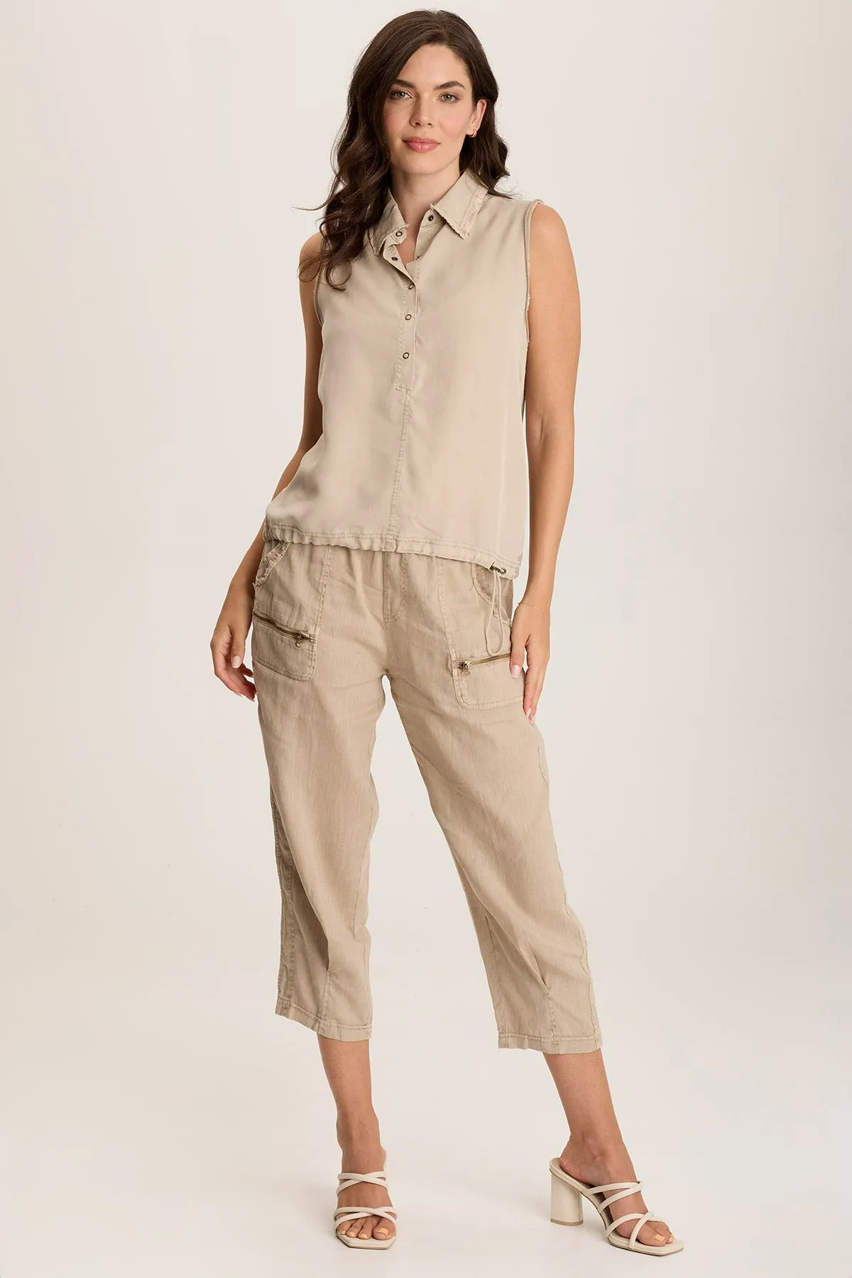 Rein Sleeveless Polo with Snap Front & Cinched Hem