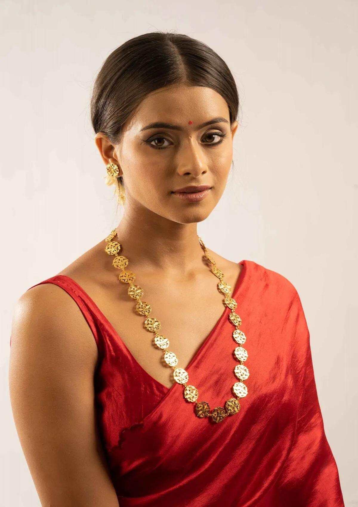 Santoshi Gold Tone Silver Necklace
